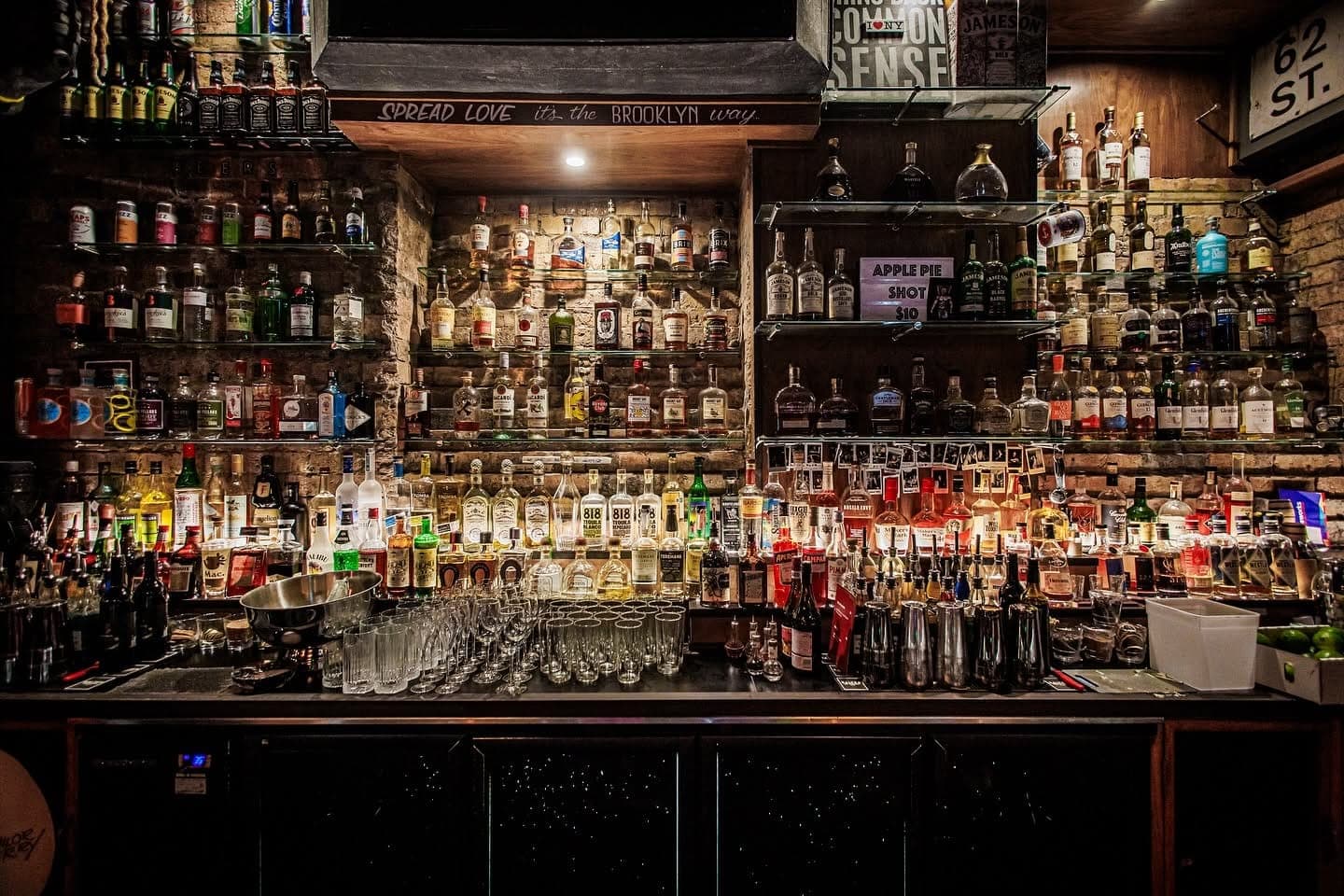 The back bar stacked floor to ceiling with bottles